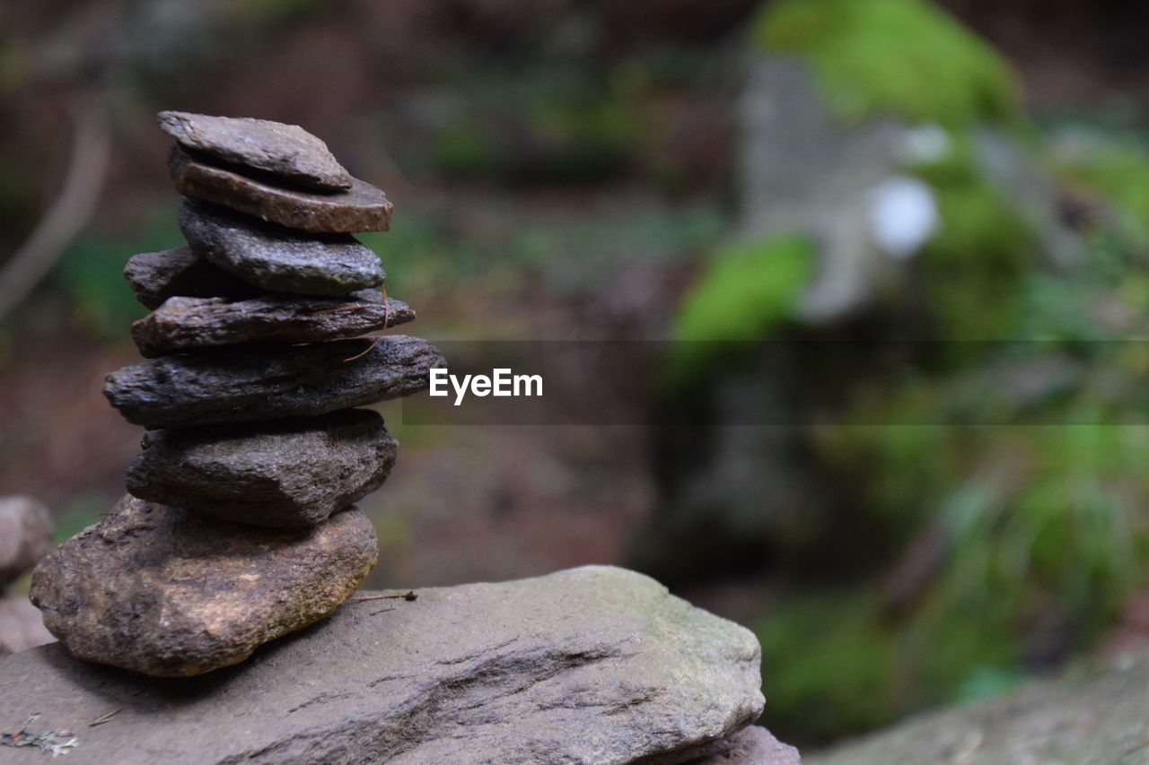 CLOSE-UP OF STACK ON ROCK