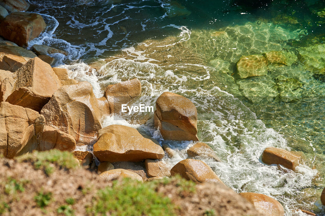 water, nature, rock, no people, day, high angle view, land, beauty in nature, sea, outdoors, beach, leaf, tranquility, sunlight, stream