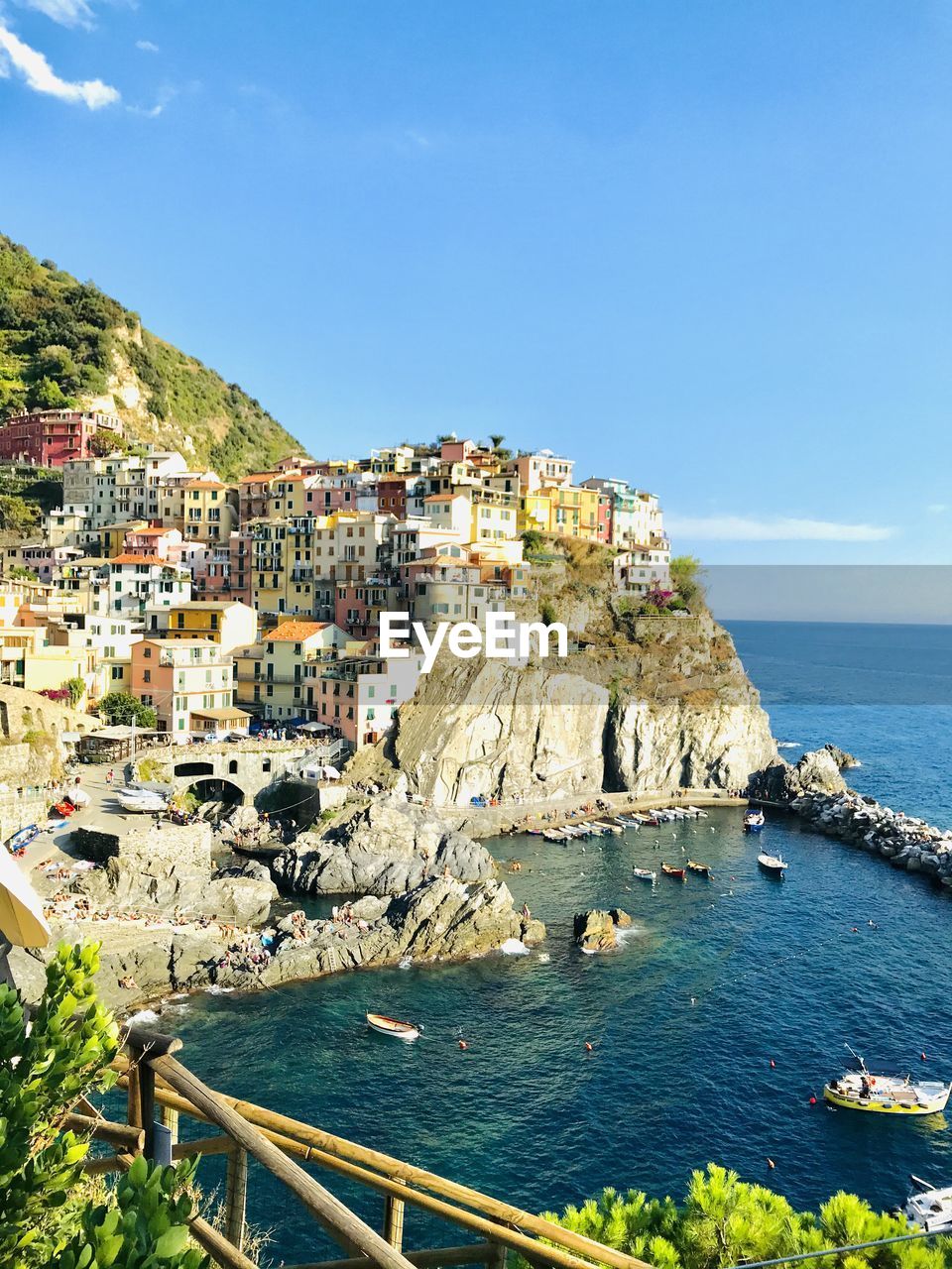 Townscape by sea against sky