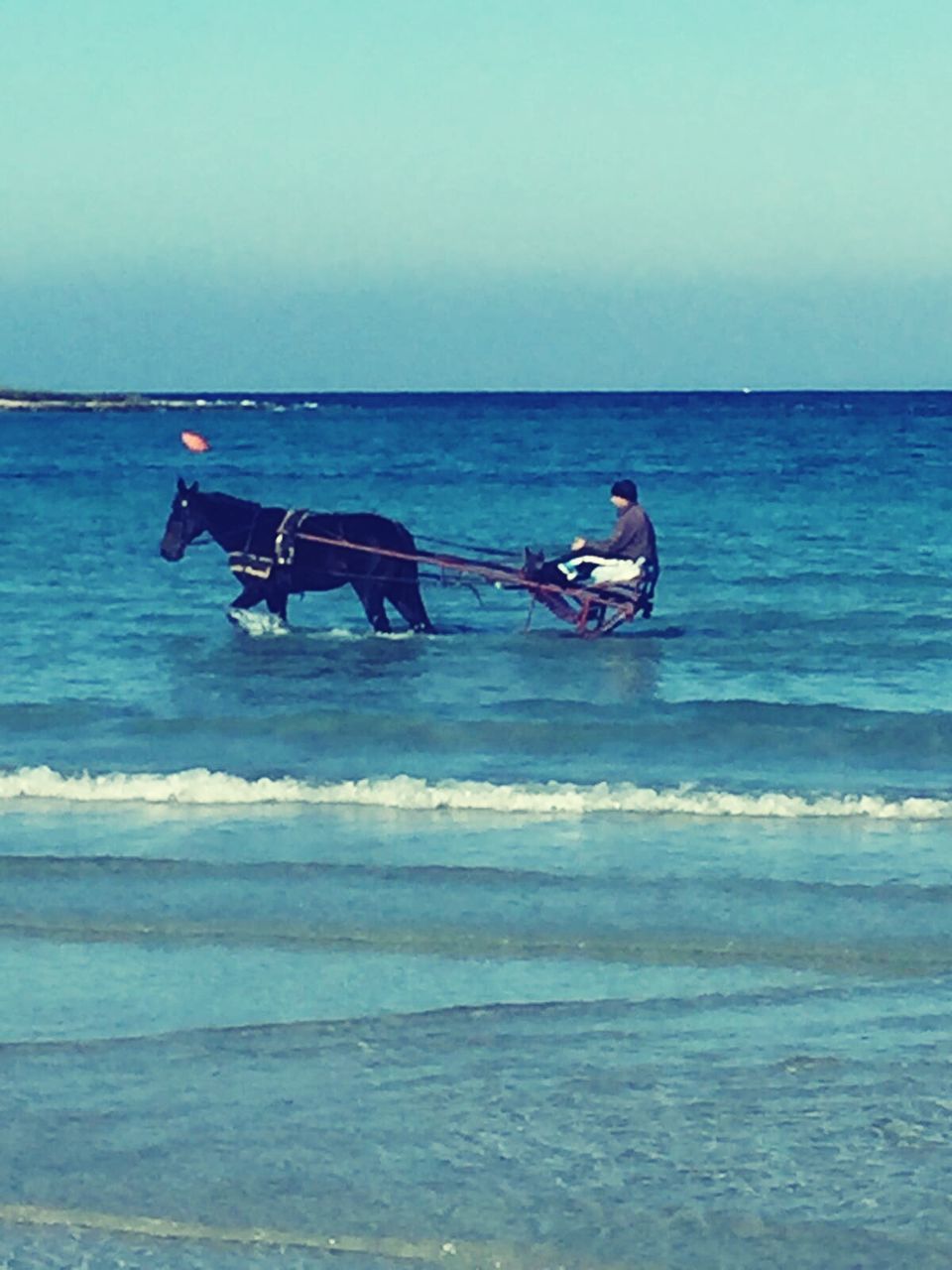 MEN ON BEACH