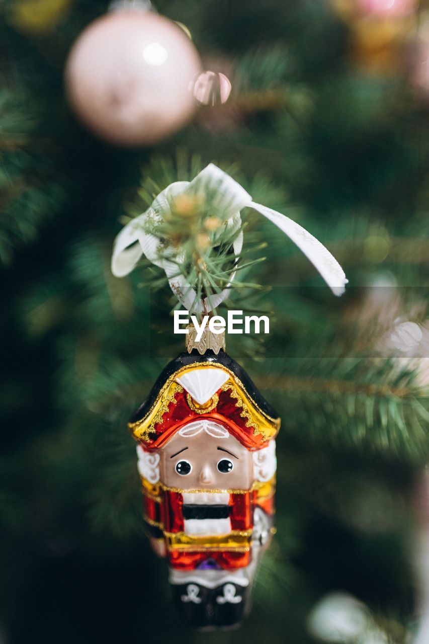 celebration, holiday, decoration, tradition, christmas tree, tree, christmas, no people, christmas decoration, plant, christmas ornament, representation, nature, event, close-up, focus on foreground, hanging, outdoors, religion, craft, selective focus, human representation