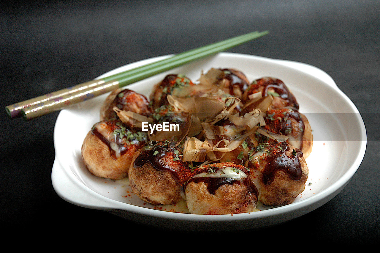 High angle view of takoyaki served in plate