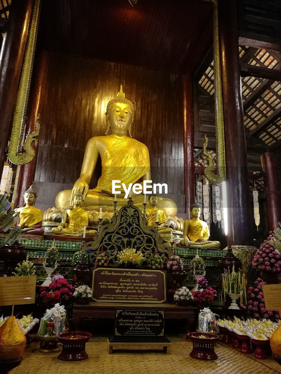 LOW ANGLE VIEW OF STATUES AT TEMPLE