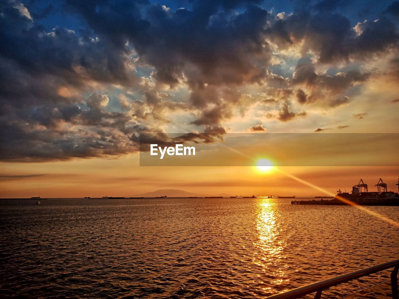 SCENIC VIEW OF SEA DURING SUNSET