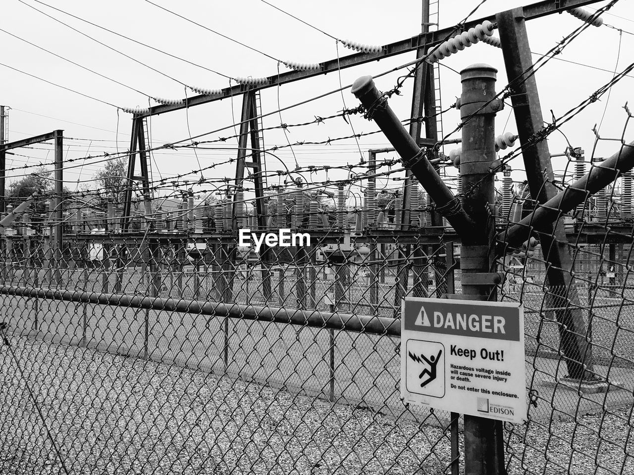 INFORMATION SIGN ON FENCE