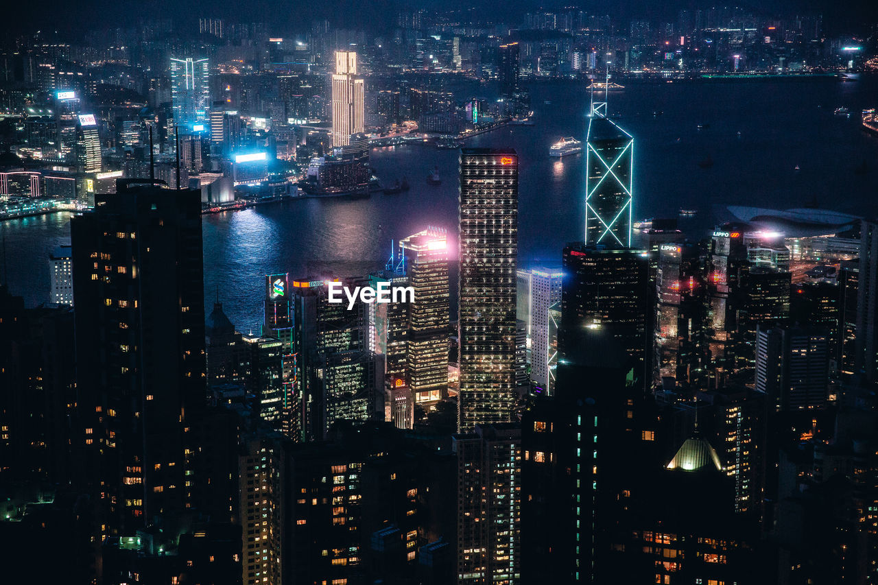 High angle view of illuminated buildings at night