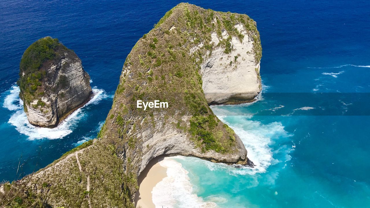 High angle view of rock formation in sea