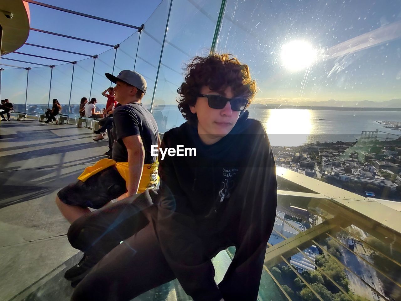 Boys at space needle, seattle washington, tourism way up high