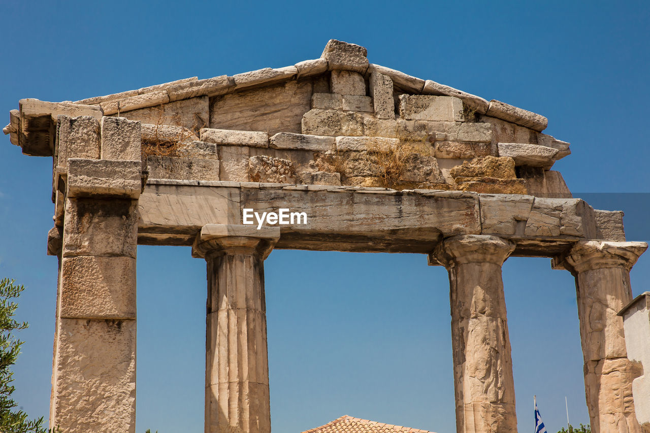 Ruins of the gate of athena archegetis located at the athens roman agora