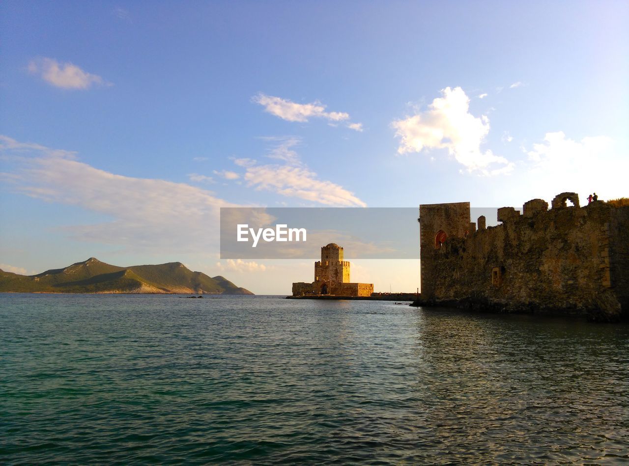 The bourtzi tower of medieval fortress in methoni on sunset time, peloponnese