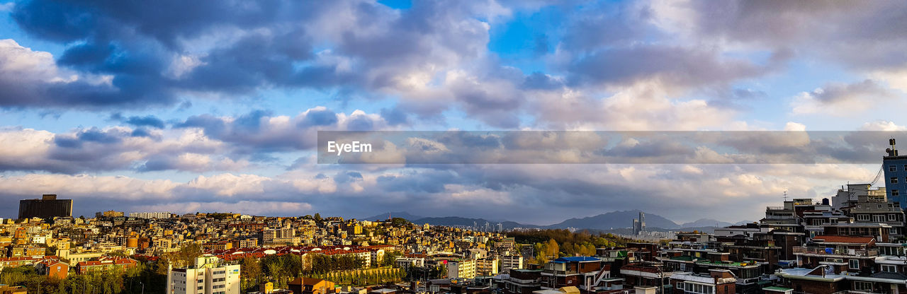 High angle shot of townscape against sky