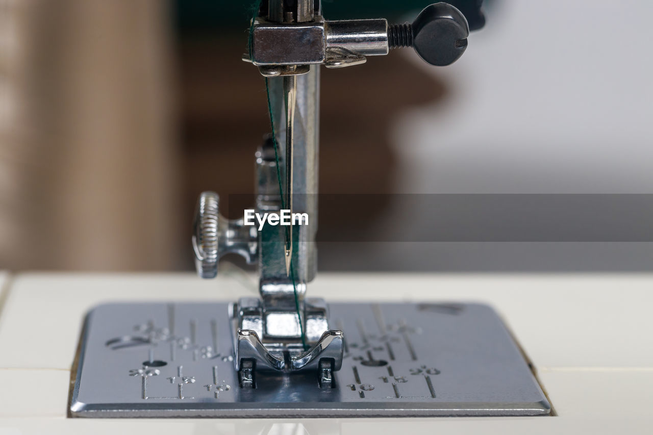 close-up of sewing machine at factory