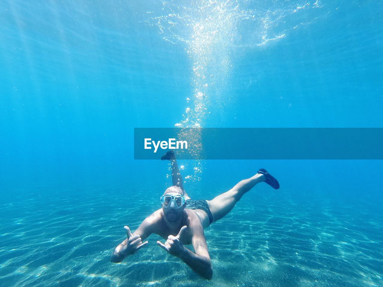 Full length of man swimming in sea