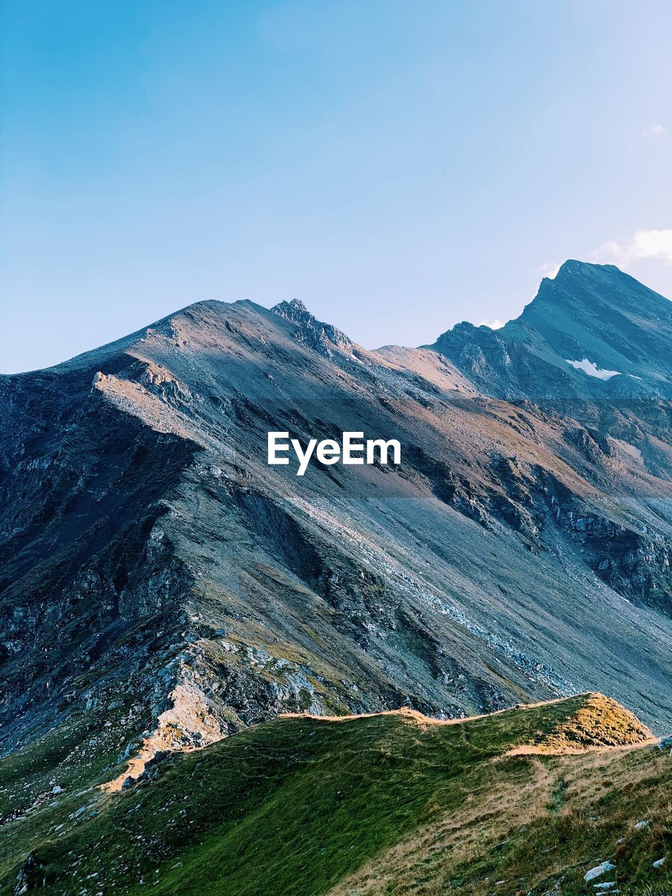 Scenic view of mountains against clear sky. 