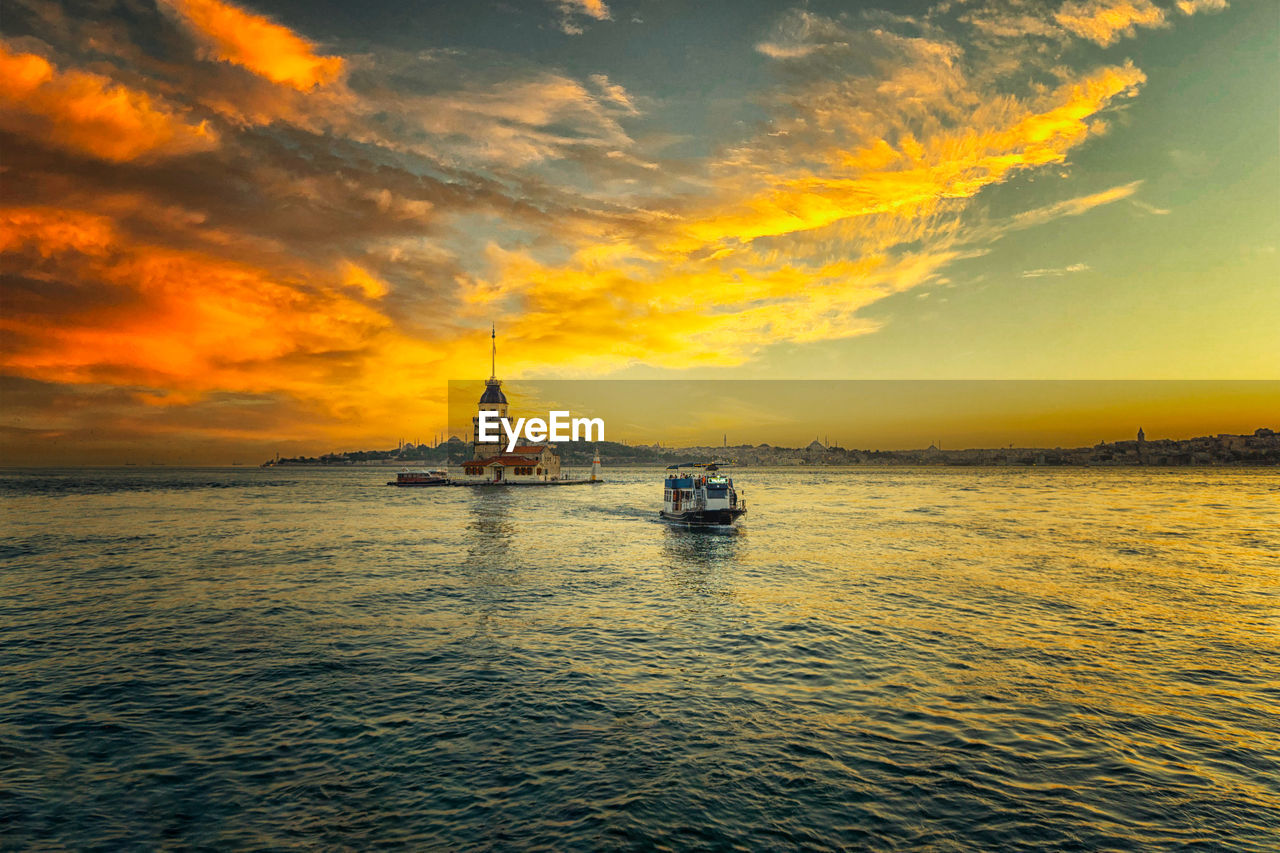 Scenic view of sea against sky during sunset