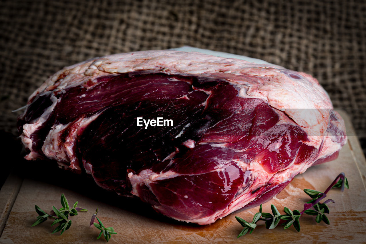 food and drink, food, meat, freshness, raw food, red meat, animal fat, lamb and mutton, indoors, dish, beef, no people, still life, healthy eating, capicola, cutting board, ingredient, vegetable, flesh, cooking, table, close-up, studio shot, kobe beef, spice, red, steak, herb, slice, wellbeing