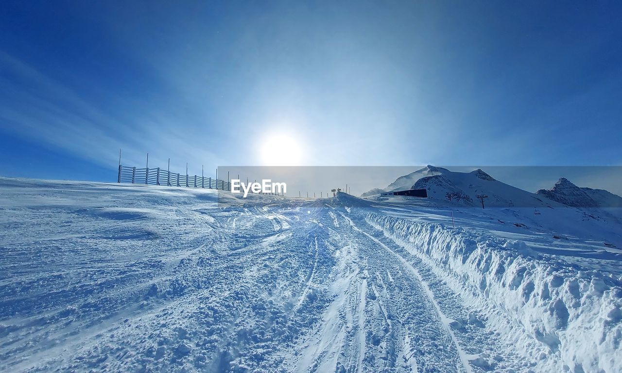 Snow covered mountain against sky