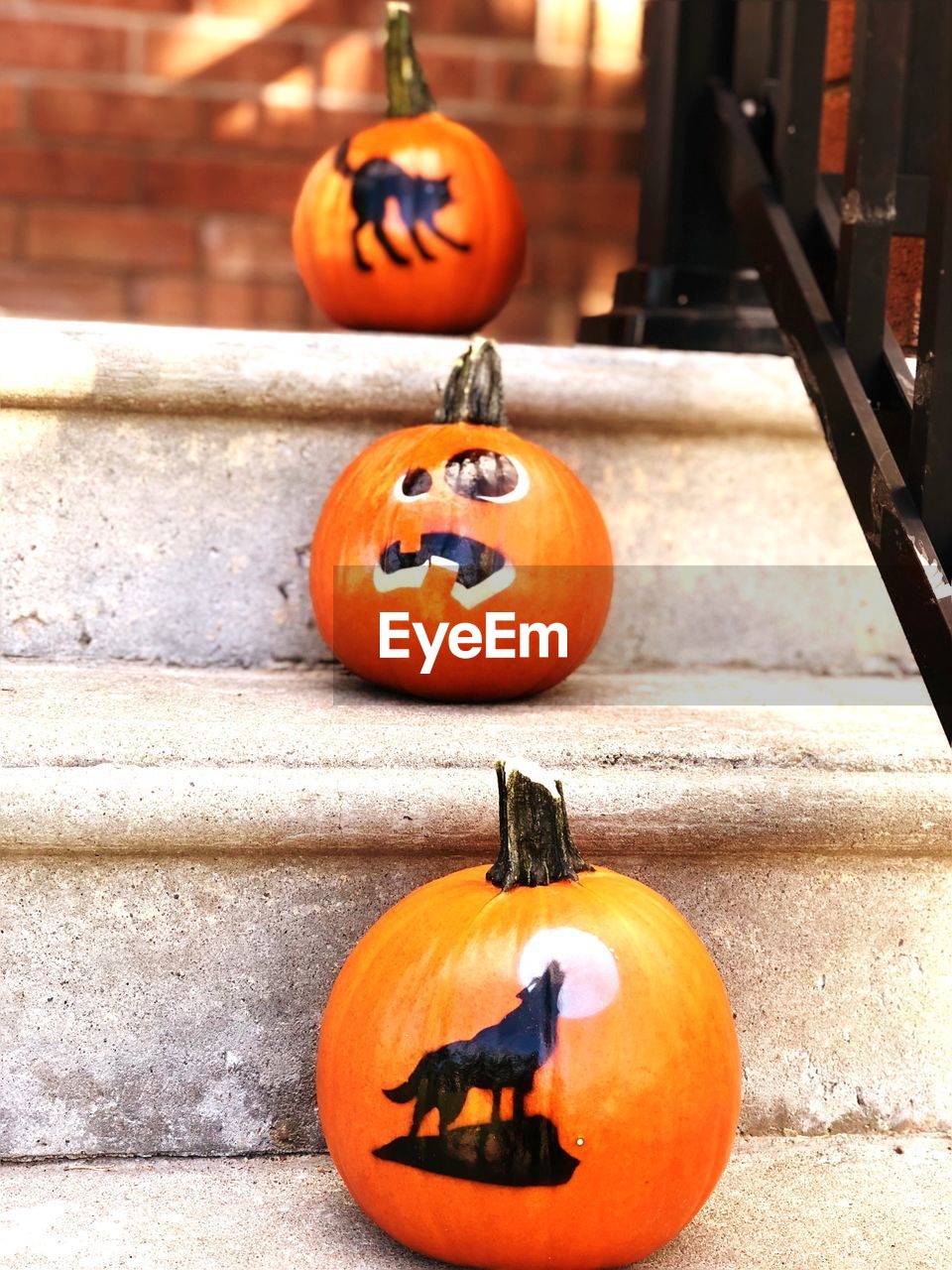 Pumpkins arranged on steps during halloween