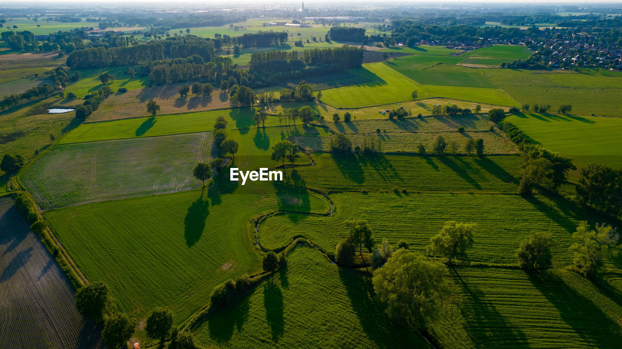European countryside. an aerial view of the belgian countryside on a bright spring dusk evening