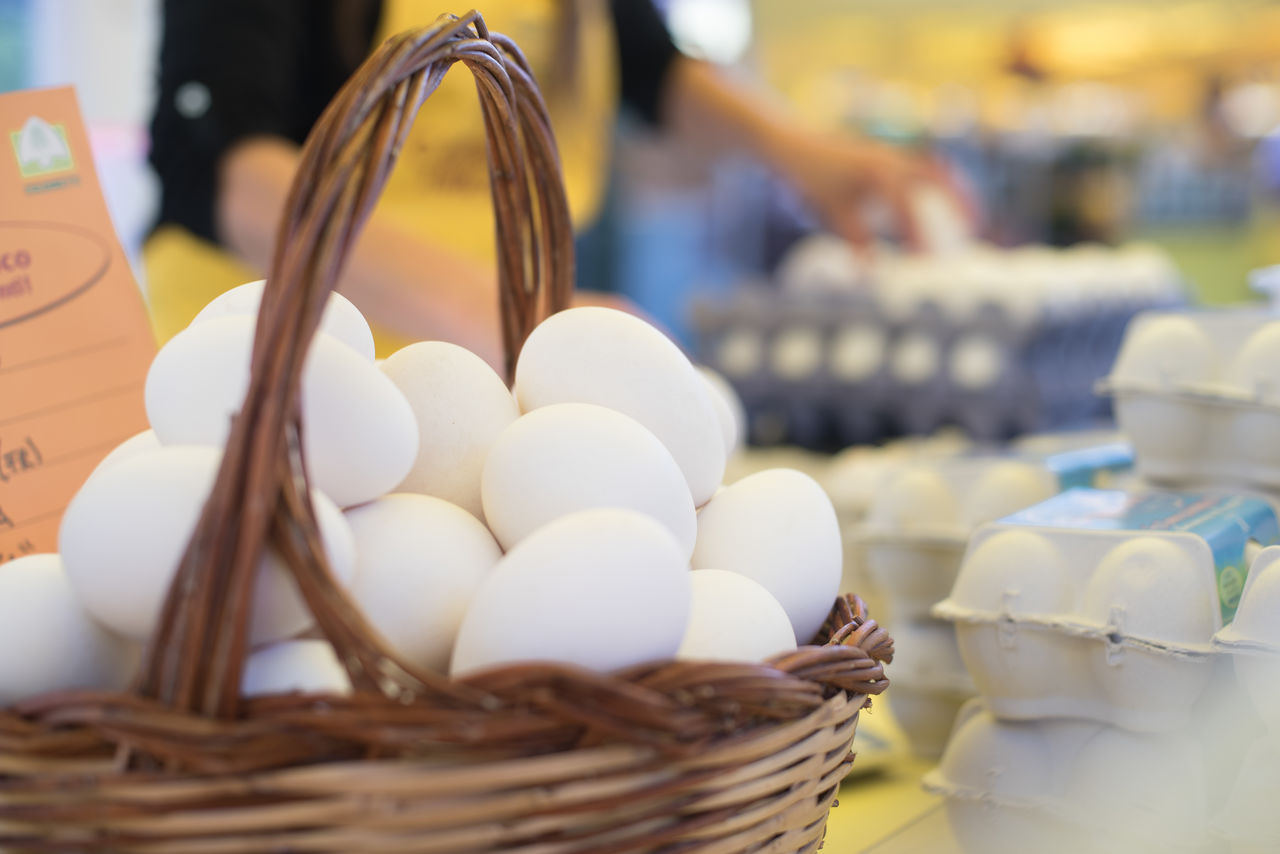 Close-up of eggs in basket for sale at market