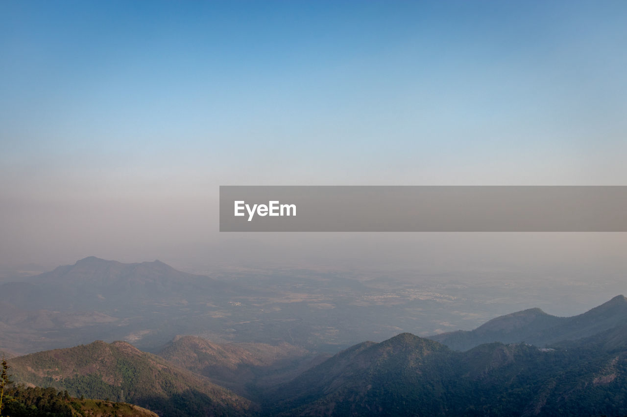 Scenic view of mountains against sky during sunset