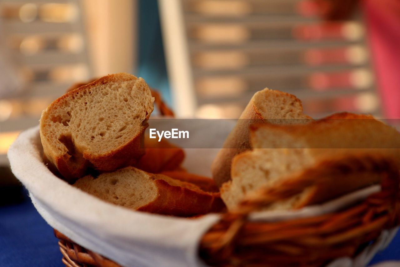 Close-up of breads in basket on table