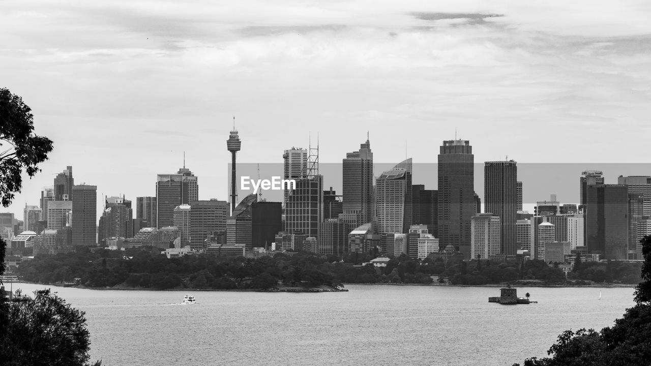 Modern buildings in city against sky