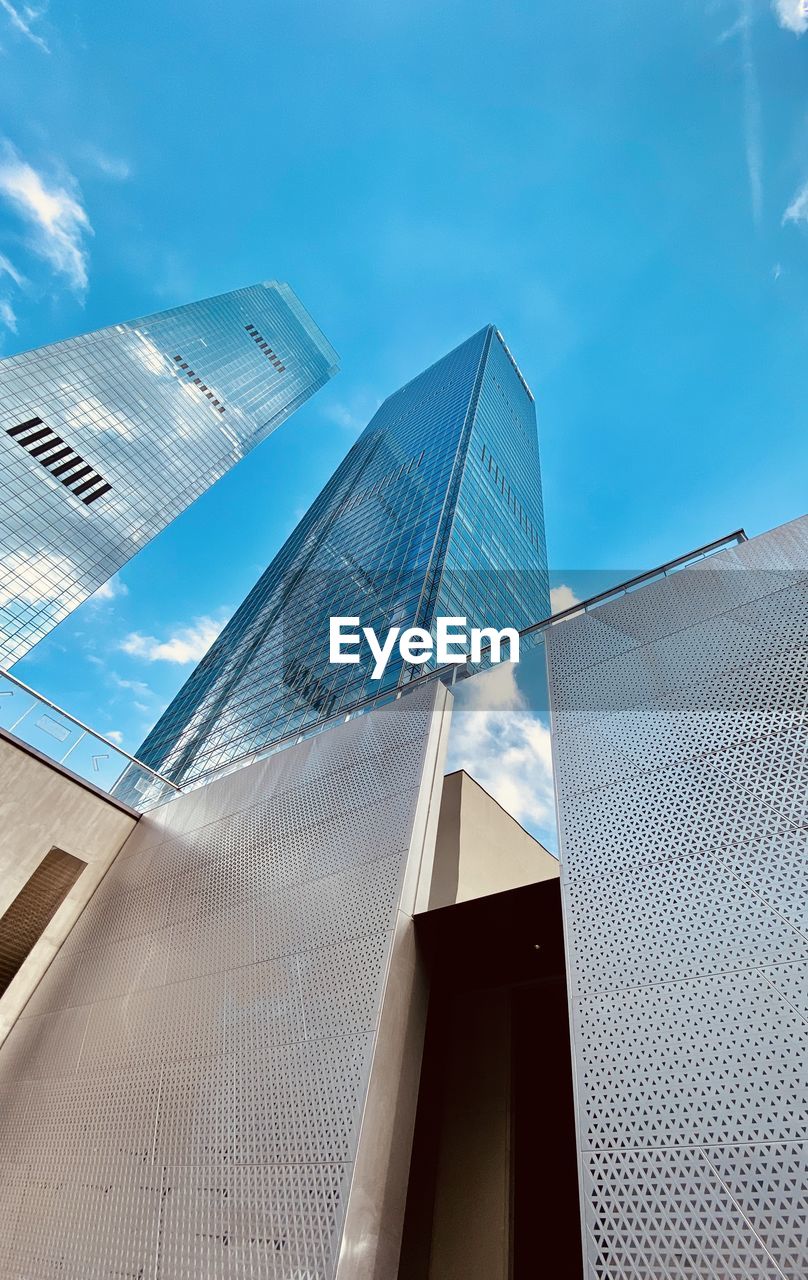 Low angle view of modern building against sky