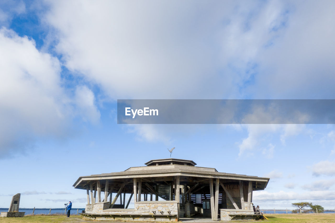 LOW ANGLE VIEW OF BUILDING ON PIER