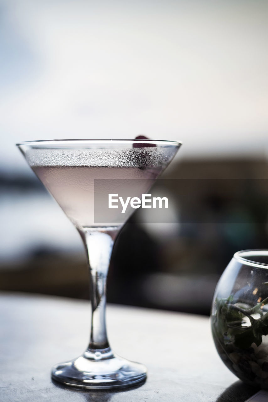 close-up of drinking glass on table