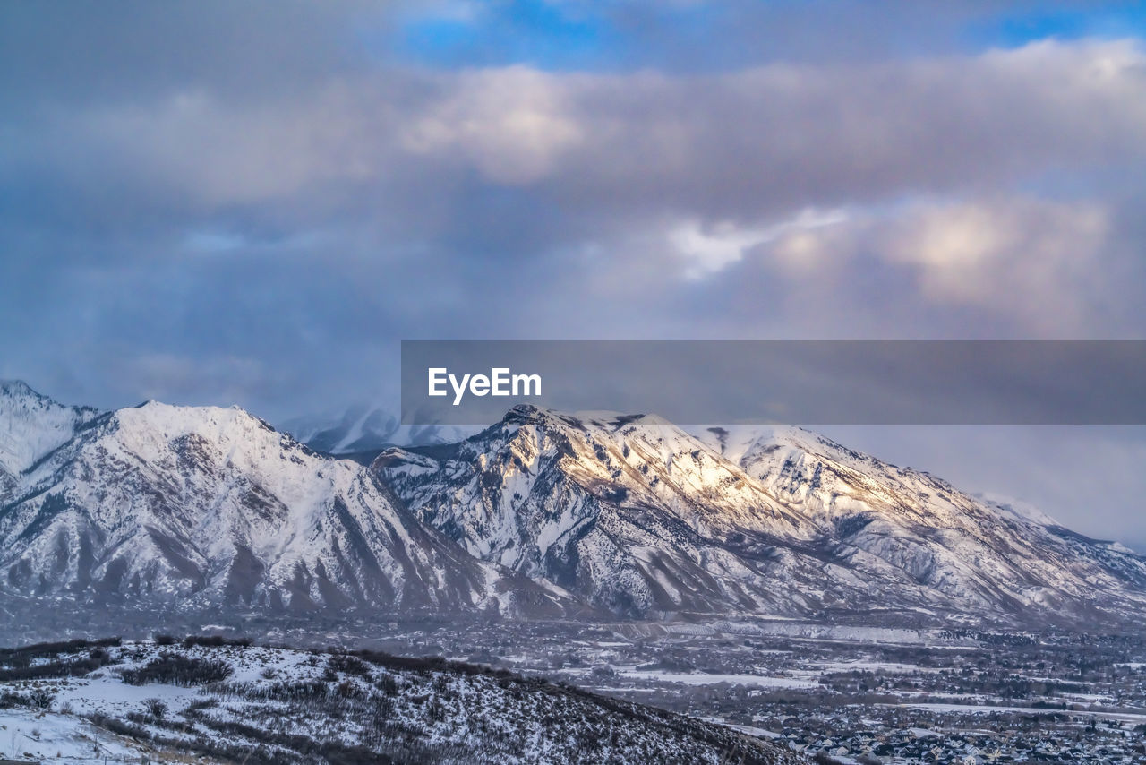 SNOWCAPPED MOUNTAIN AGAINST SKY