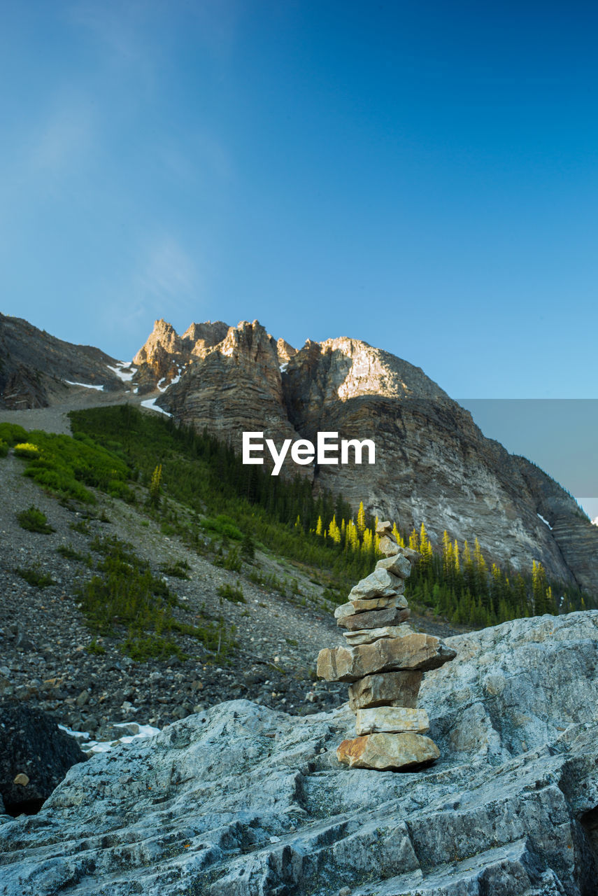 Scenic view of mountain against clear blue sky