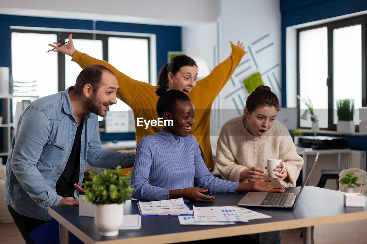 Group of people working on table