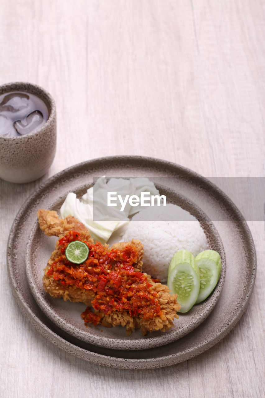 directly above shot of food in plate on table