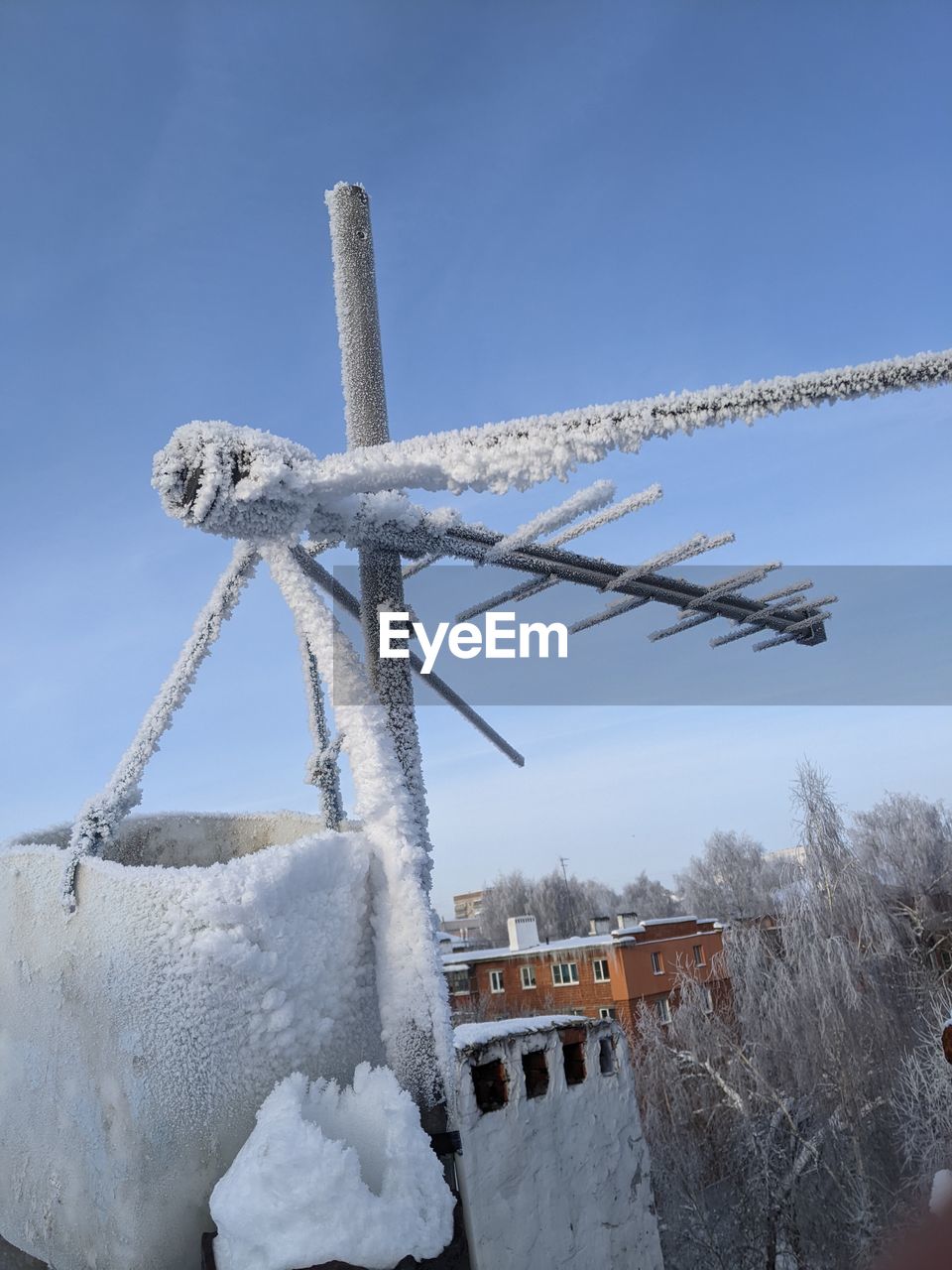 winter, snow, cold temperature, wind, nature, sky, architecture, windmill, no people, mill, environment, frozen, freezing, day, blue, ice, built structure, outdoors, white, clear sky, renewable energy, tree