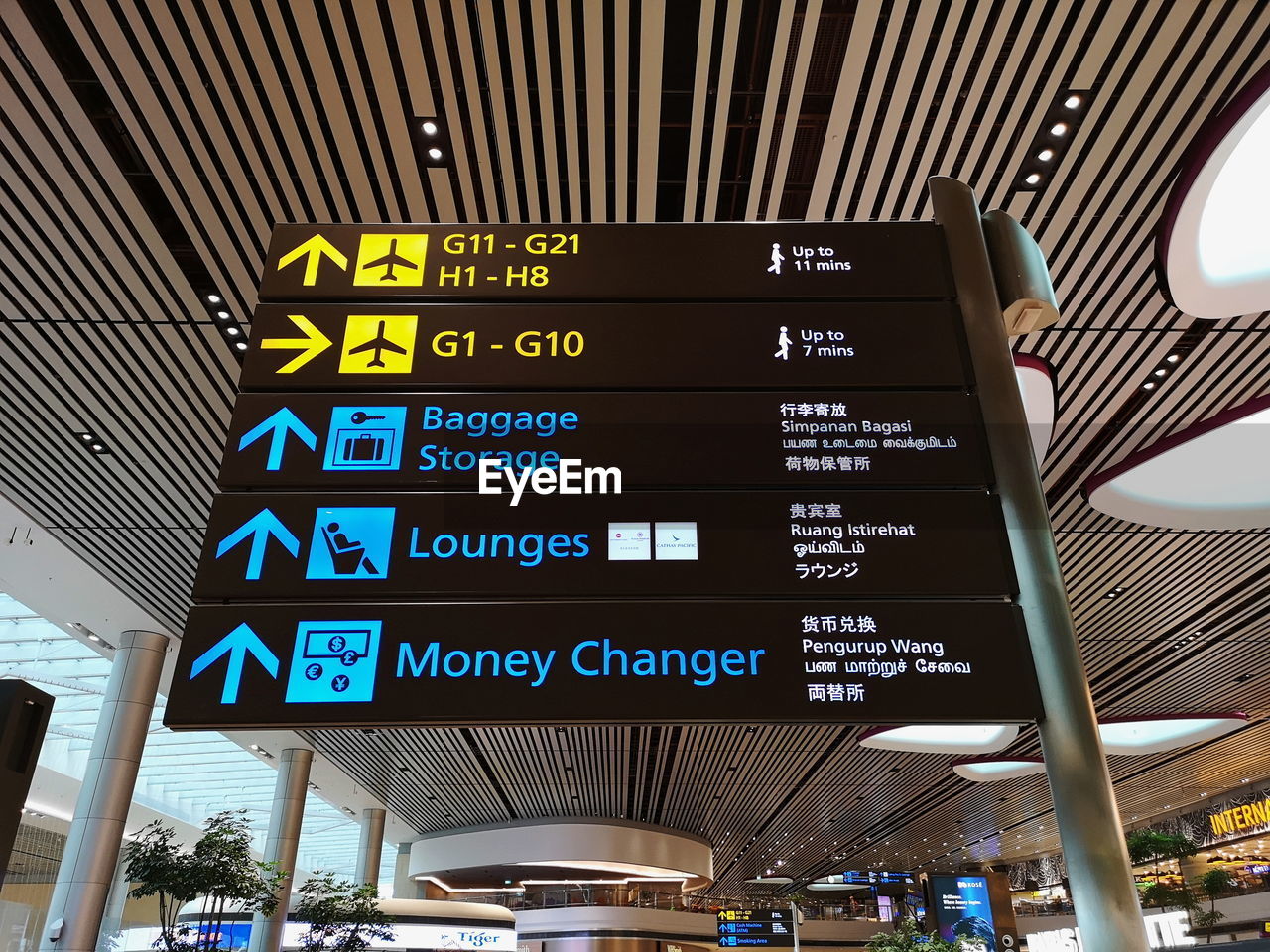 LOW ANGLE VIEW OF TEXT ON ILLUMINATED SIGN AT BUS STATION