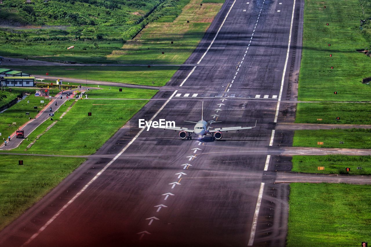 High angle view of airplane on road