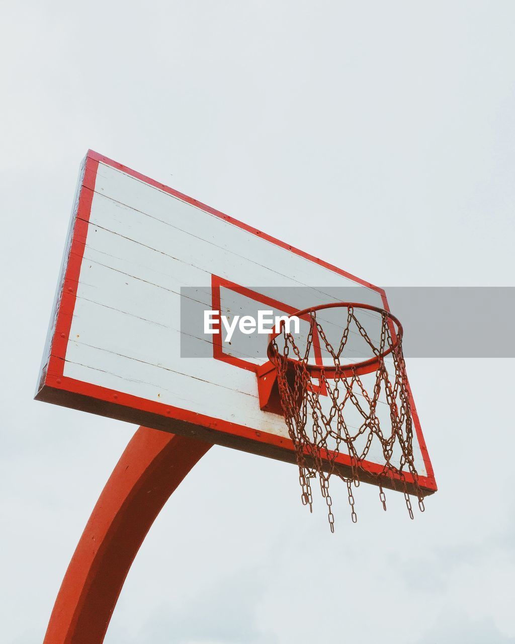 Low angle view of basketball hoop against sky