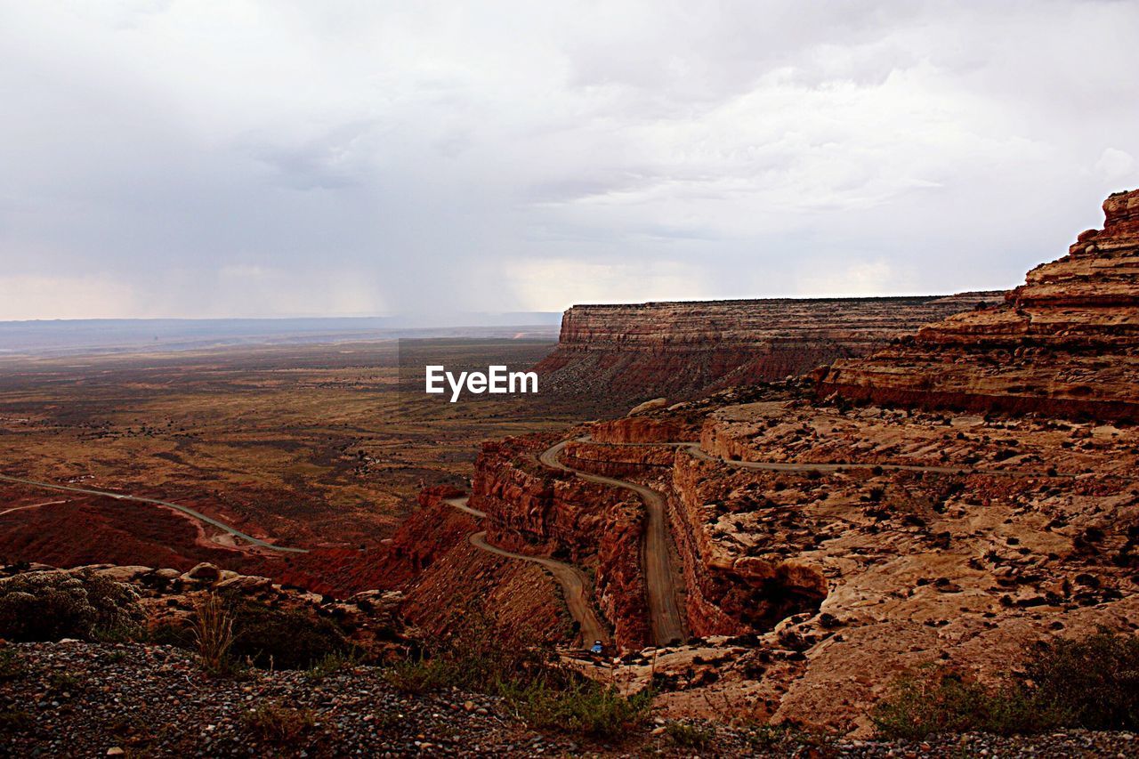 High angle view of desert against cloudy sky