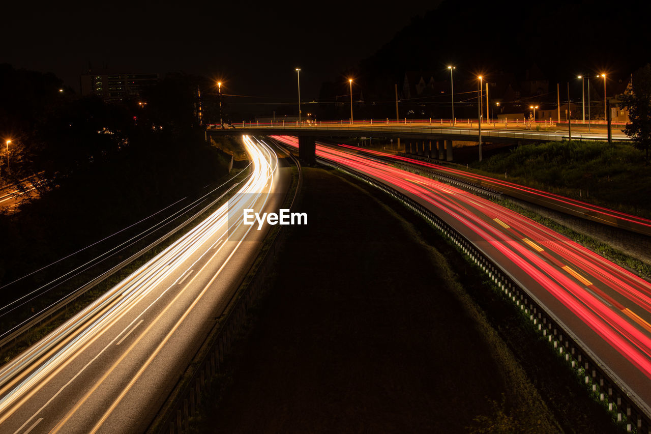 LIGHT TRAILS ON HIGHWAY