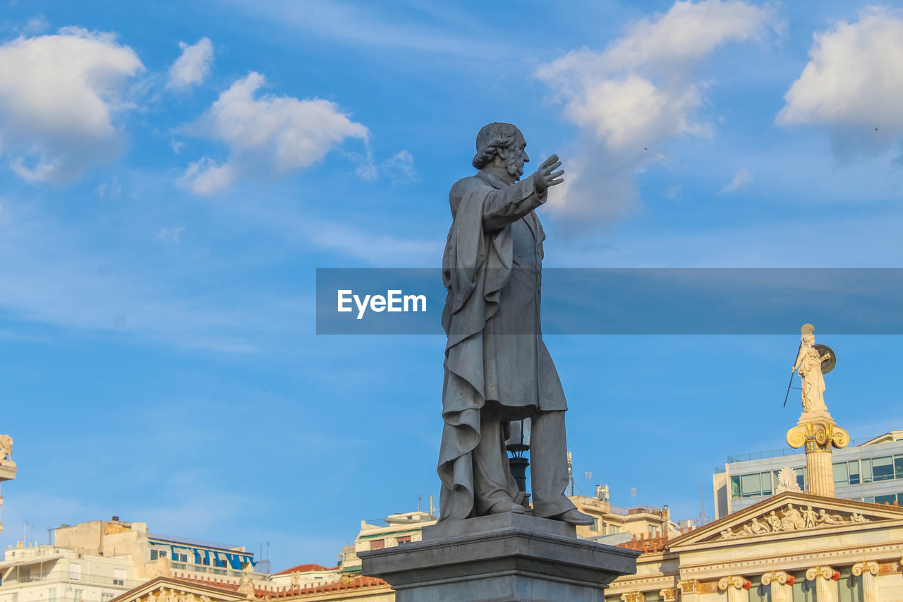 LOW ANGLE VIEW OF STATUE OF A BUILDING