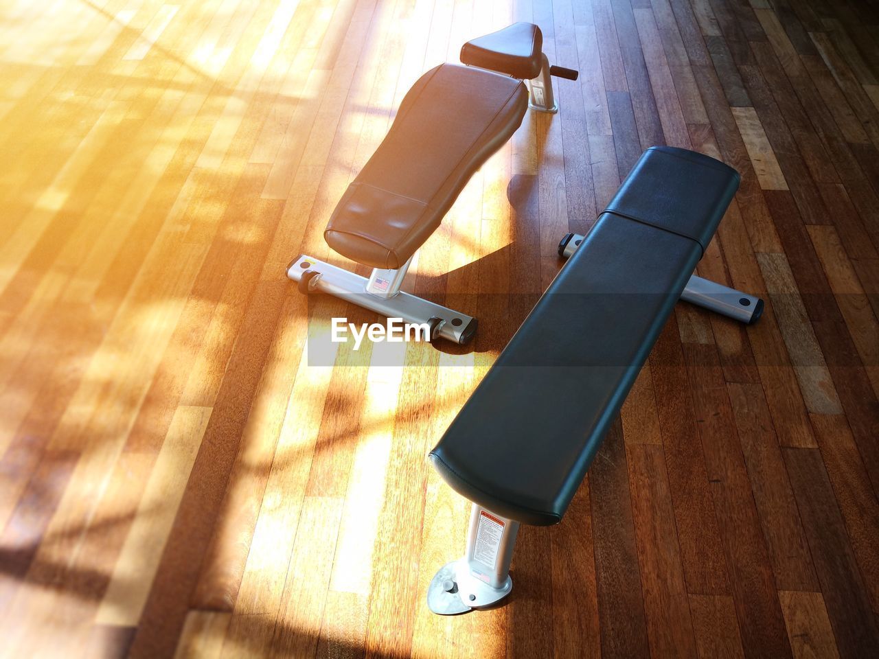 High angle view of exercise equipment in gym