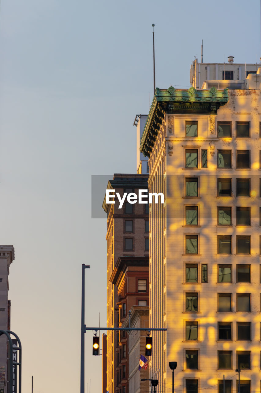 Low angle view of buildings against clear sky