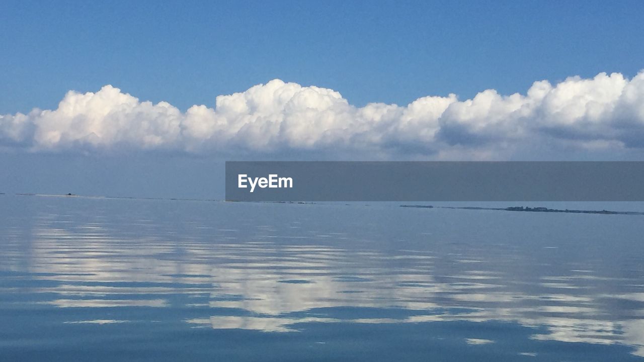 SCENIC VIEW OF CALM SEA AGAINST SKY