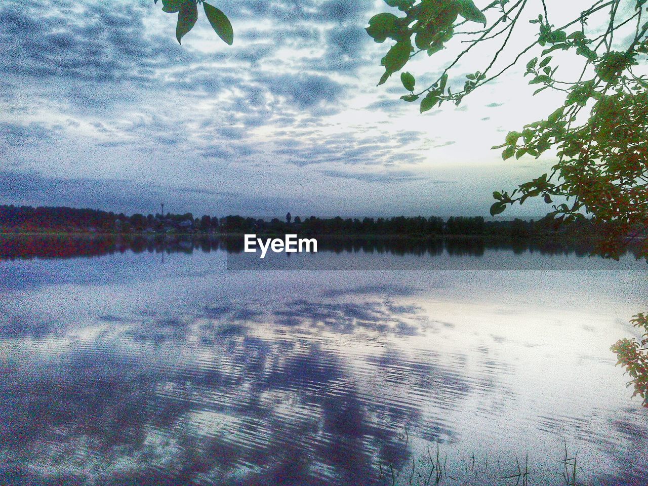 REFLECTION OF SKY ON LAKE