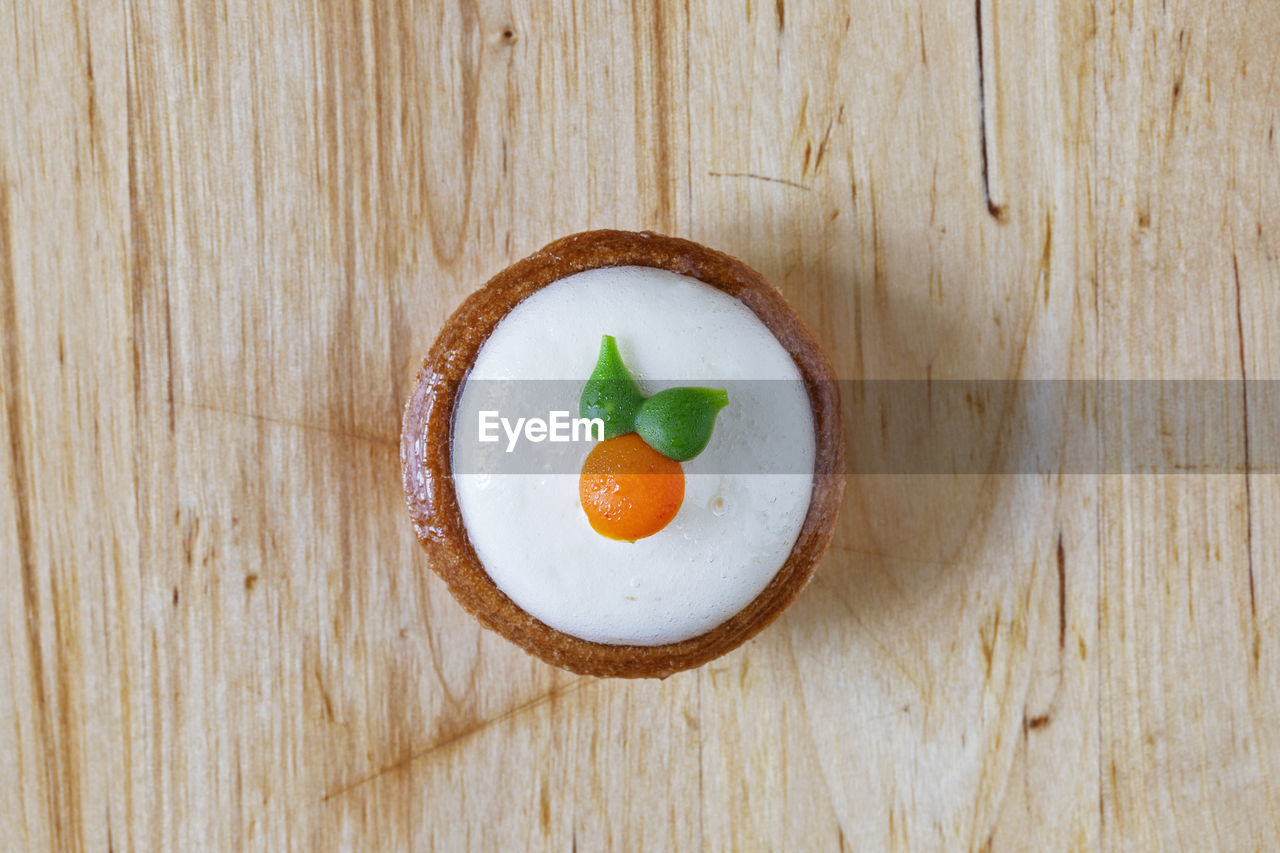 food and drink, food, wood, healthy eating, freshness, wellbeing, table, fruit, directly above, indoors, high angle view, no people, dessert, produce, still life, sweet food, bowl, egg, sweet, herb, breakfast, dish