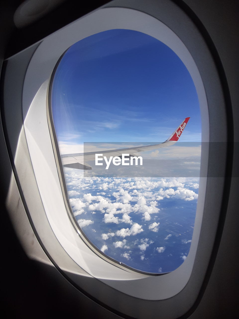 VIEW OF SKY SEEN FROM AIRPLANE WINDOW