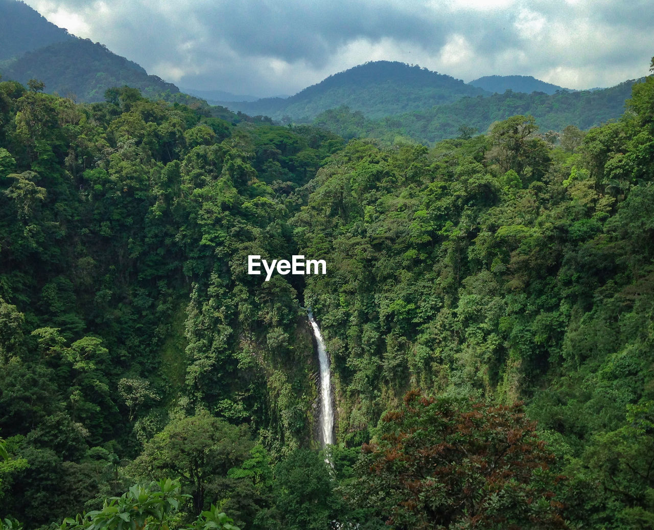 Beautiful lonely waterfall in the costa rican jungle