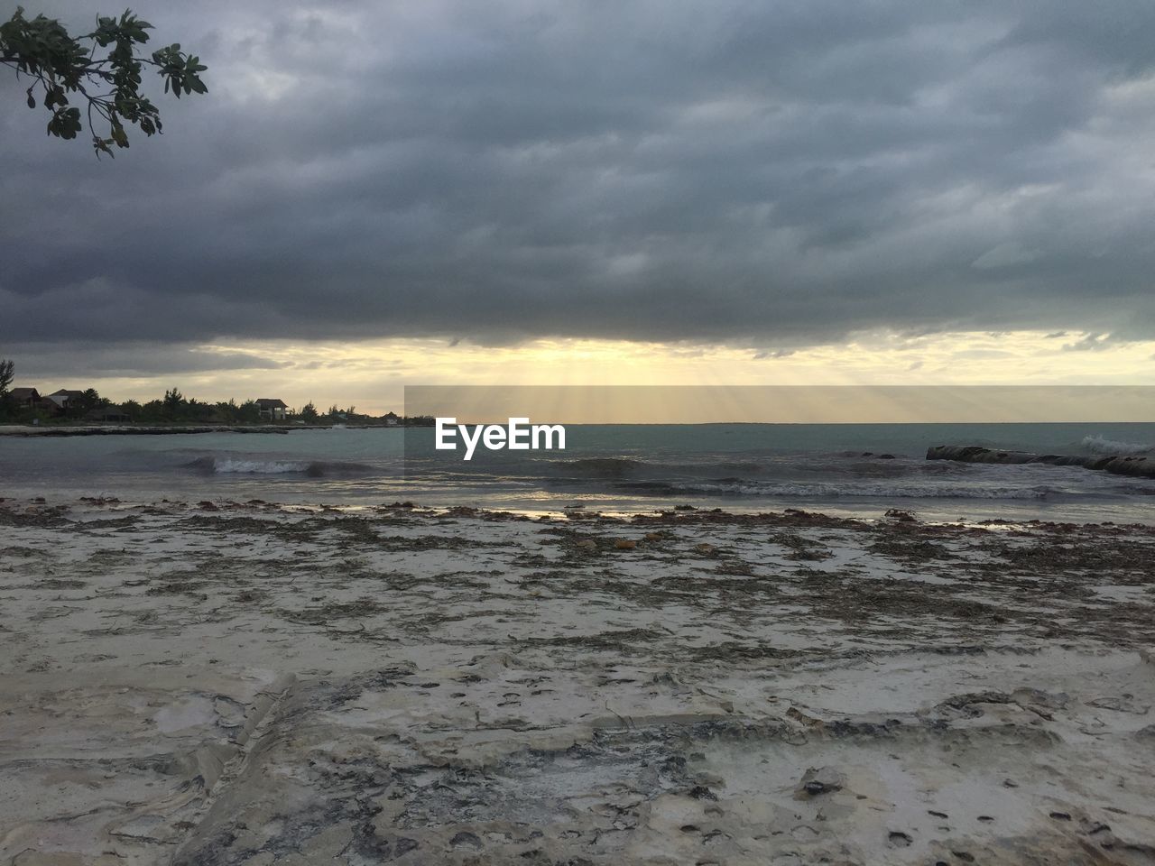 SCENIC VIEW OF SEA AGAINST STORM CLOUDS
