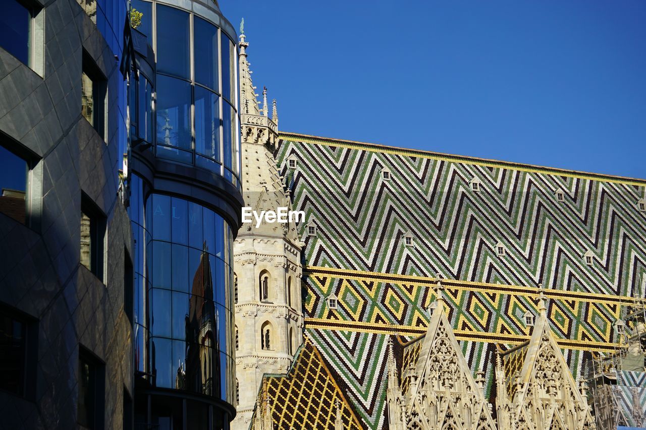 Low angle view of st stephens cathedral against clear blue sky